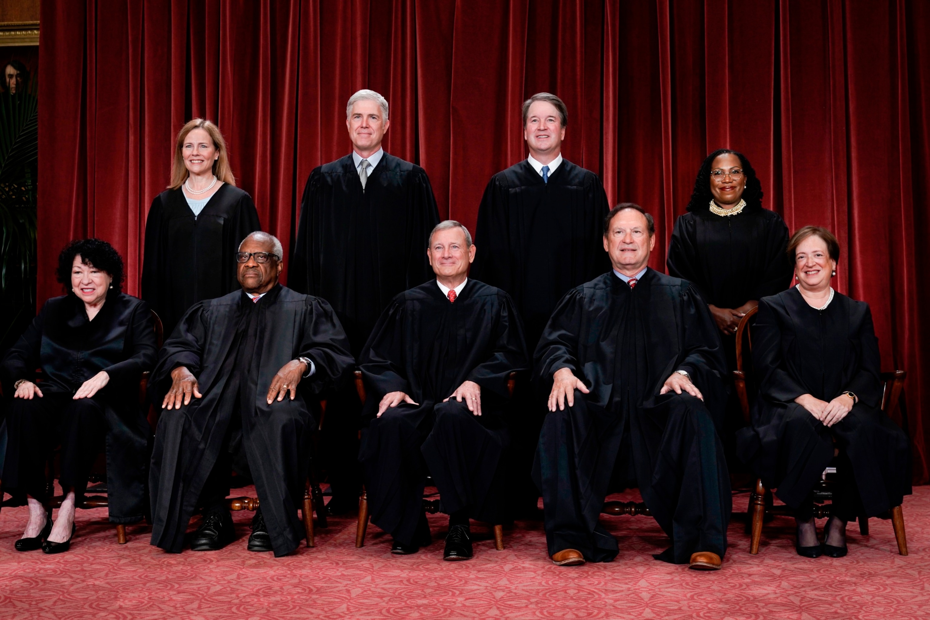 PHOTO: Members of the Supreme Court sit for a group portrait following the addition of Associate Justice Ketanji Brown Jackson, at the Supreme Court building in Washington, Oct. 7, 2022. 