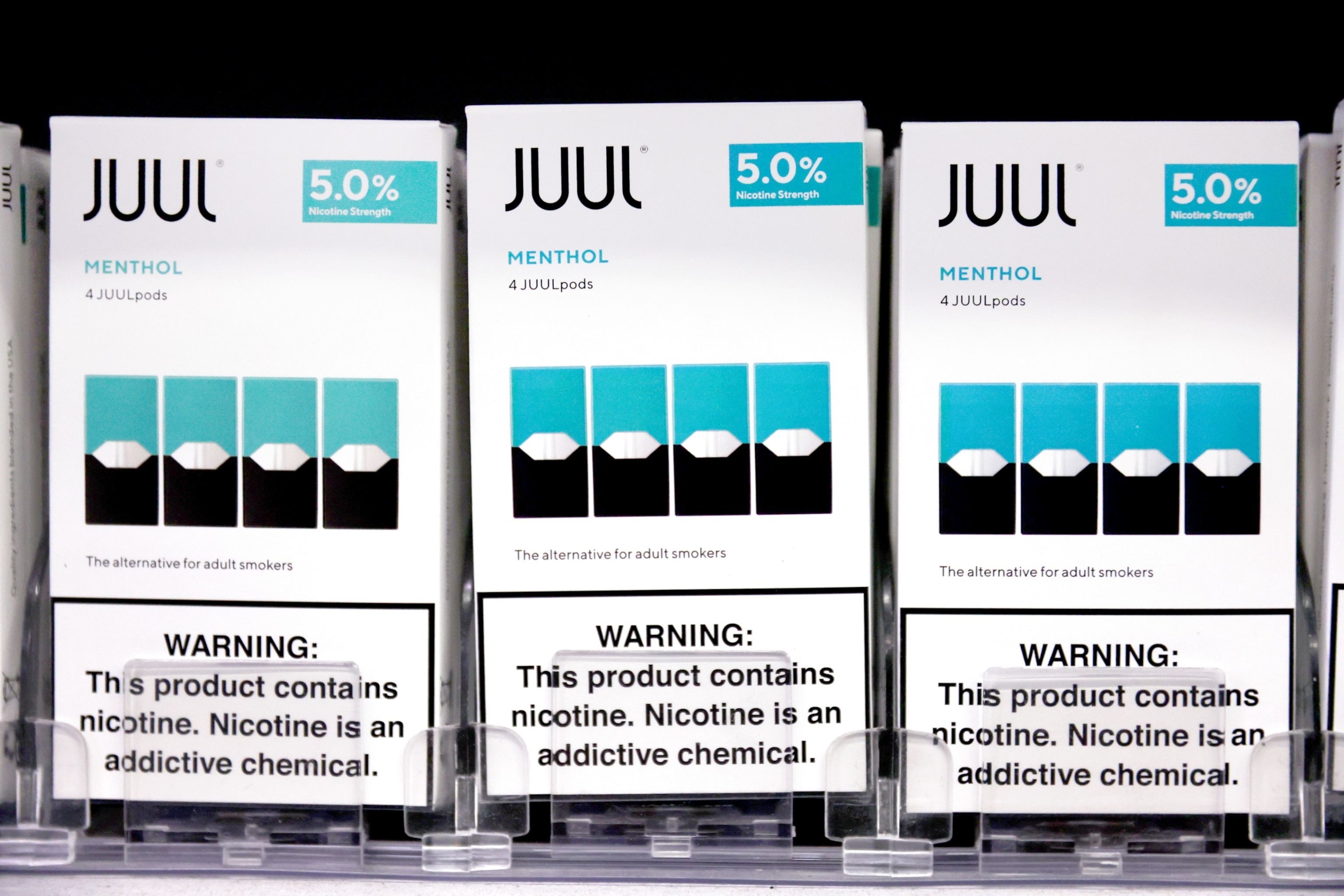 PHOTO: Packages of Juul e-cigarettes are displayed for sale in the Brazil Outlet shop on June 22, 2022 in Los Angeles.