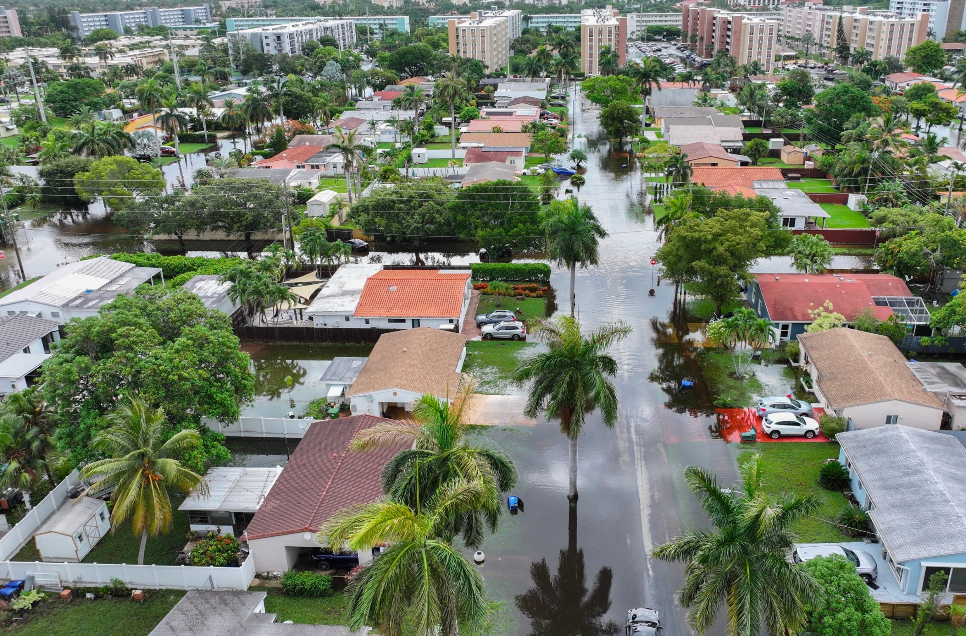 PHOTO: In an aerial view, flood waters inundate a neighborhood on June 13, 2024, in Hallandale Beach, Florida. As tropical moisture passes through the area, areas have become flooded due to the heavy rain. 