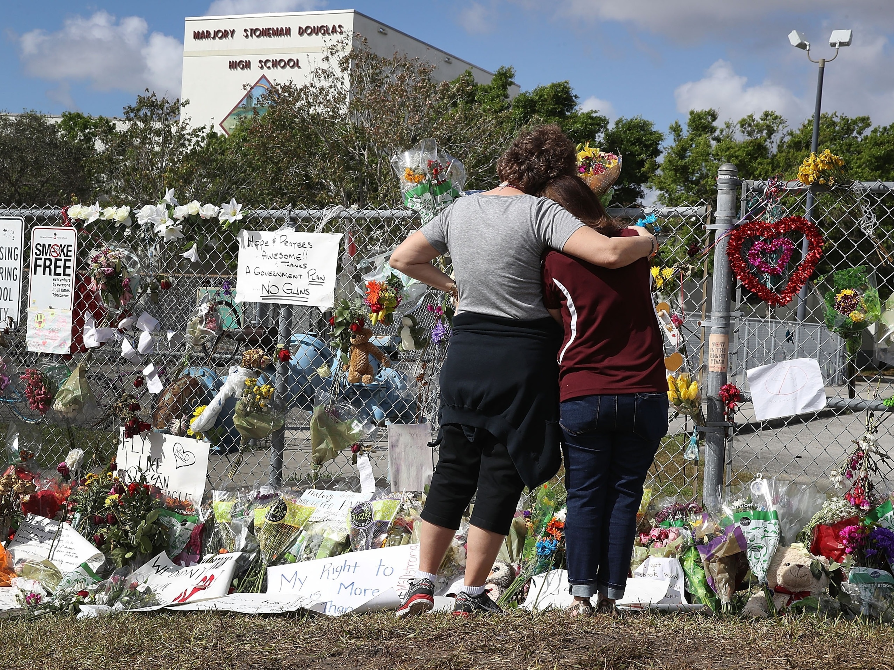 PHOTO: The memorial in front of Marjory Stoneman Douglas High School as teachers and staff are allowed to return to the school for the first time since the mass shooting on campus, Feb. 23, 2018, in Parkland, Fla.