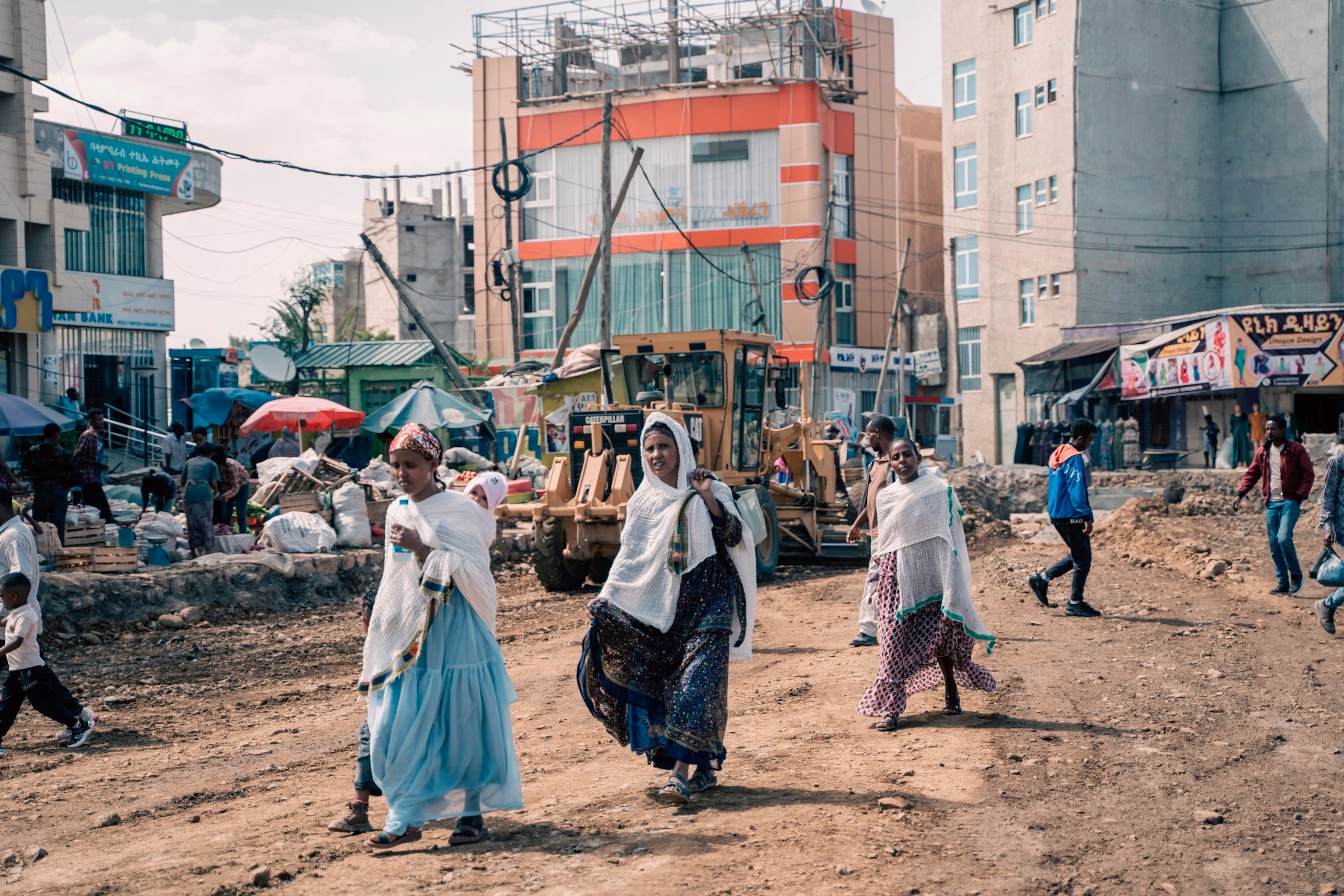 PHOTO: People walk in a newly built road in Mekele, on May 24, 2024. Mekele, the capital of Ethiopia's northernmost region of Tigray, is gradually crawling back to normality.