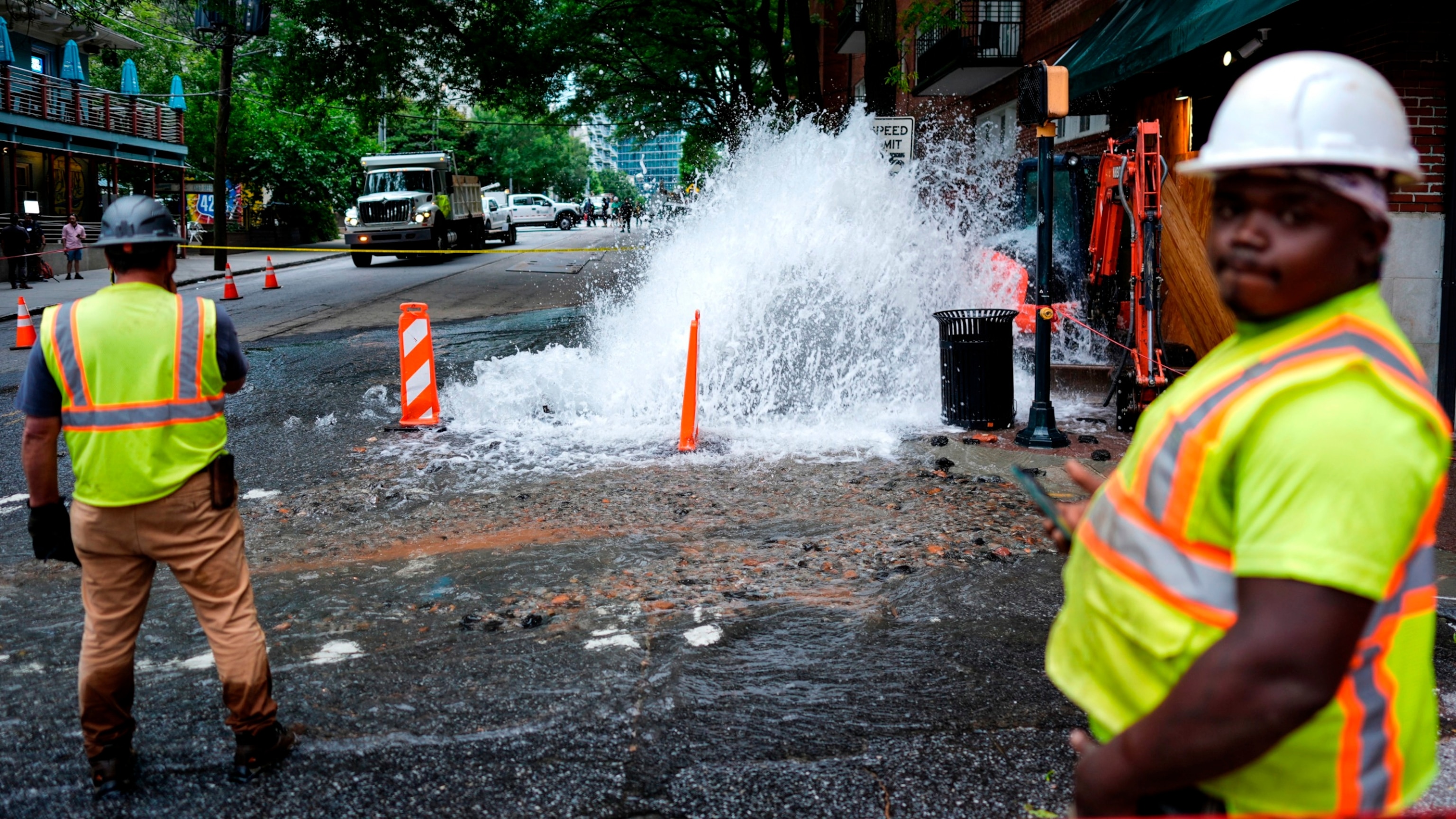 PHOTO: Workers respond to a broken water transmission line Saturday, June 1, 2024, in Atlanta. (AP Photo/Mike Stewart)