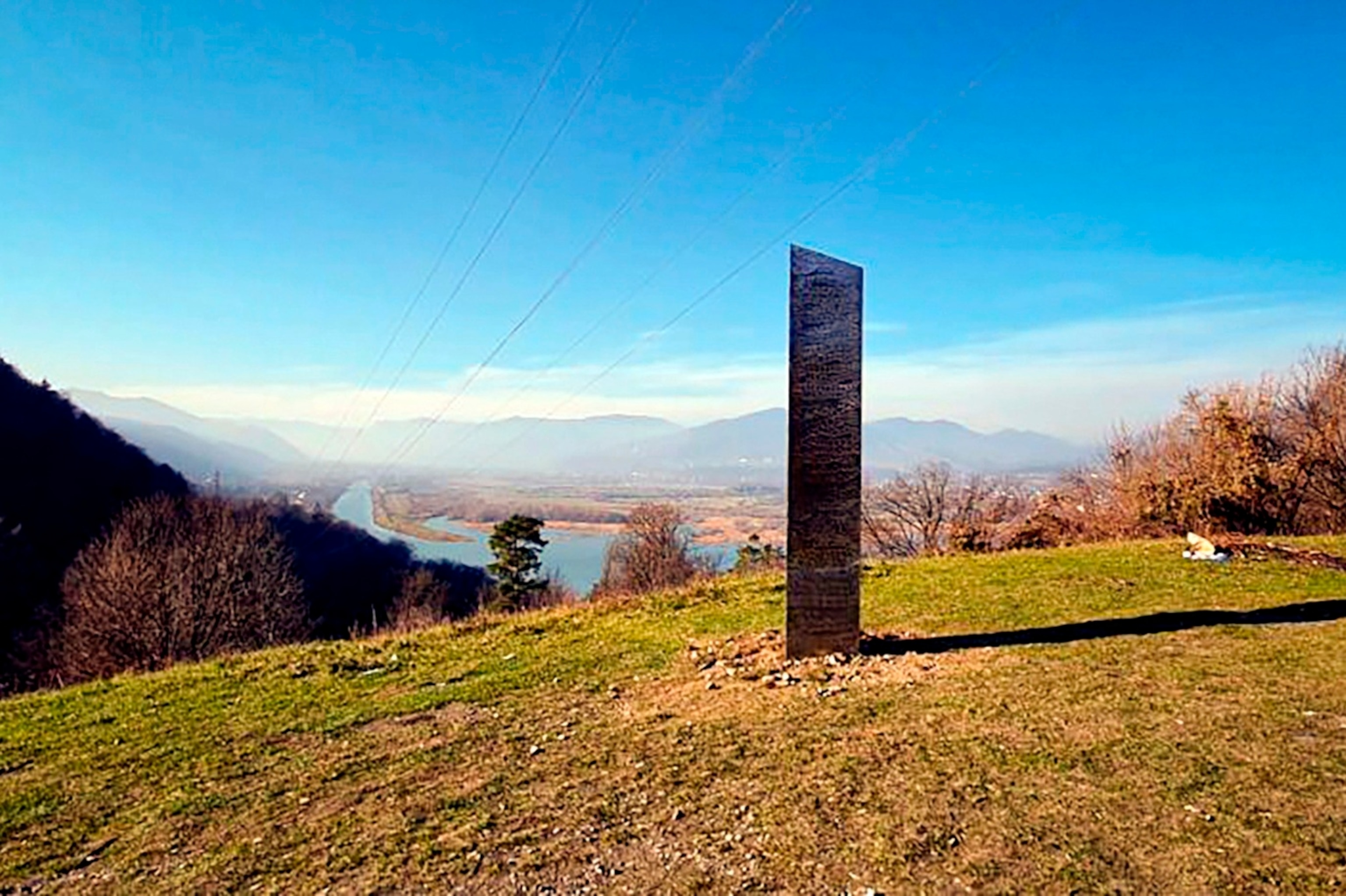 PHOTO: In this Nov. 27, 2020, file photo, a metal structure sticks out from the ground on the Batca Doamnei hill, outside Piatra Neamt, northern Romania.
