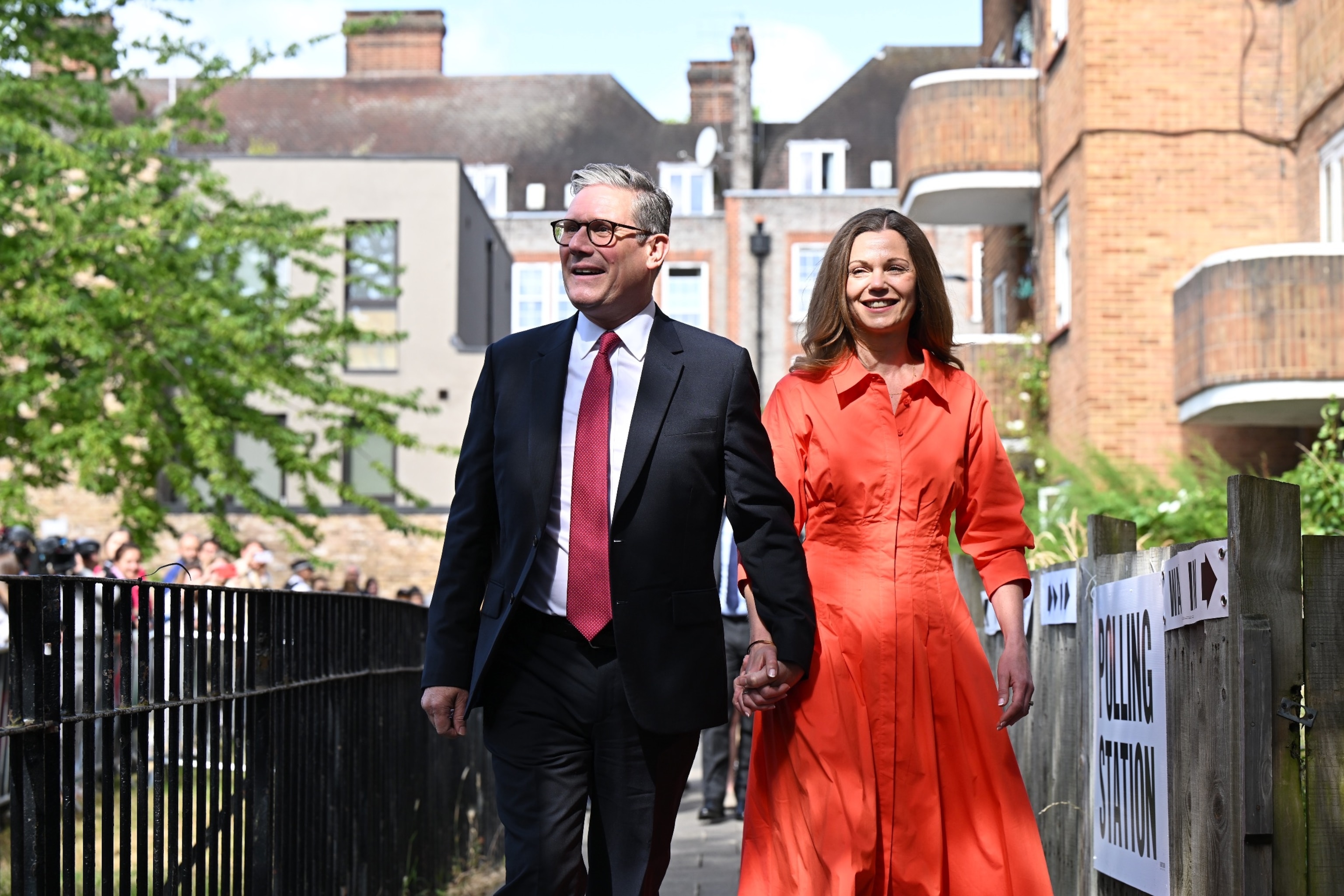 PHOTO: Labour Party leader Keir Starmer and his wife Victoria arrive to cast their votes at a polling station on July 4, 2024 in London, United Kingdom. 