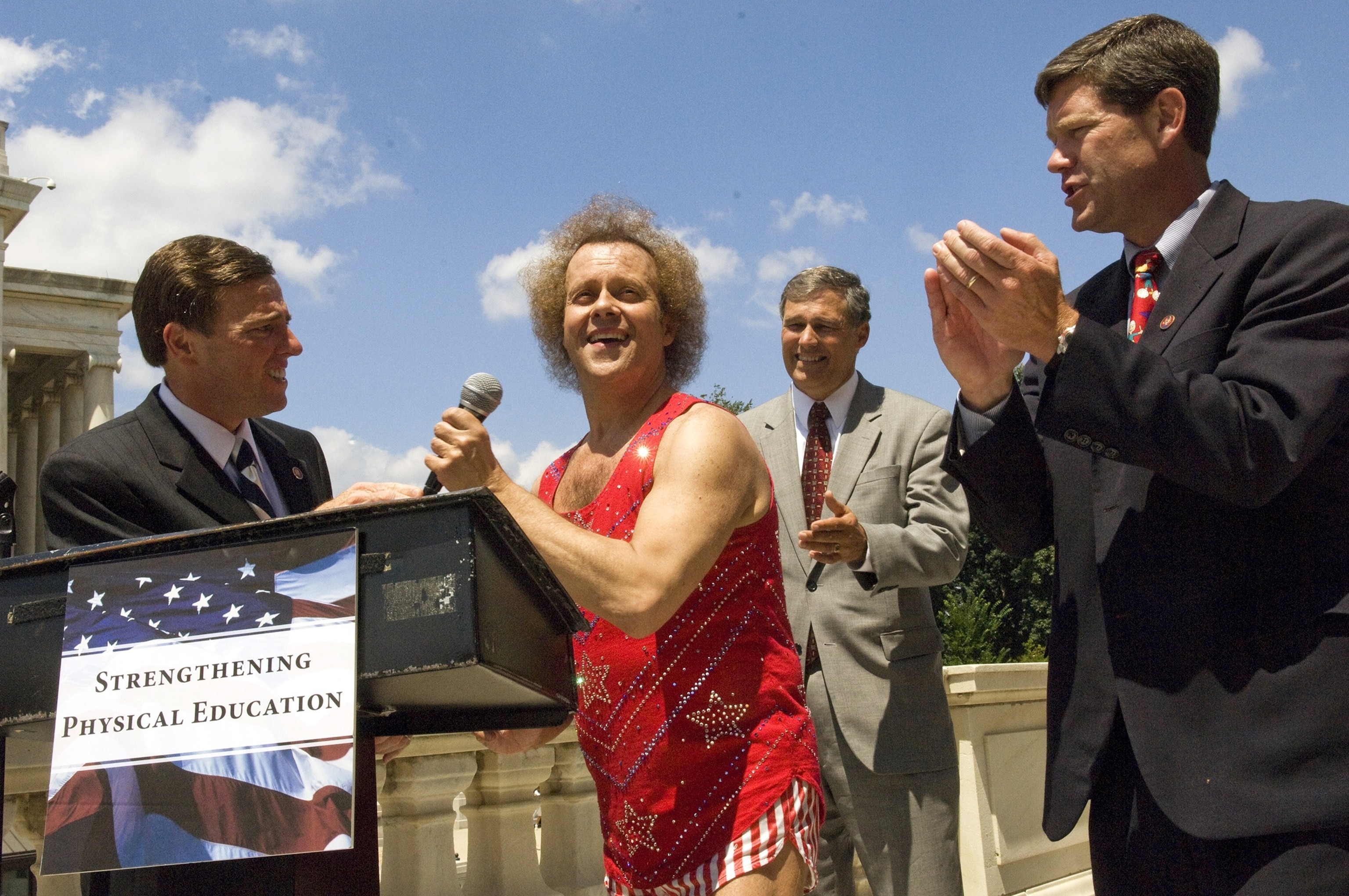 PHOTO: Fitness advocate Richard Simmons takes the microphone during a rally at the U.S. Capitol, on July 24, 2008, in Washington, D.C.