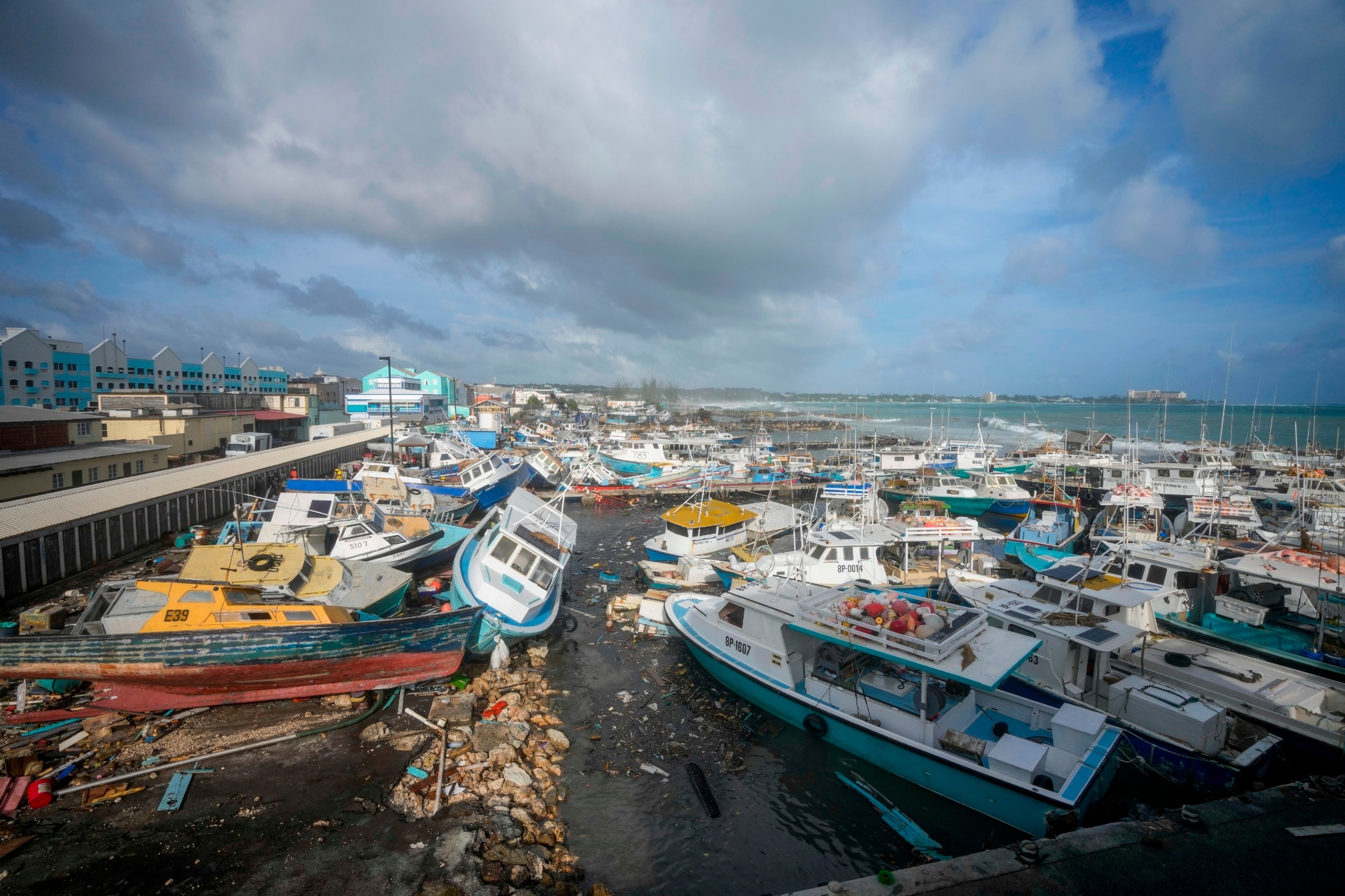 PHOTO: Fishing vessels lie damaged after Hurricane Beryl passed through the Bridgetown Fisheries in Barbados July 1, 2024. 
