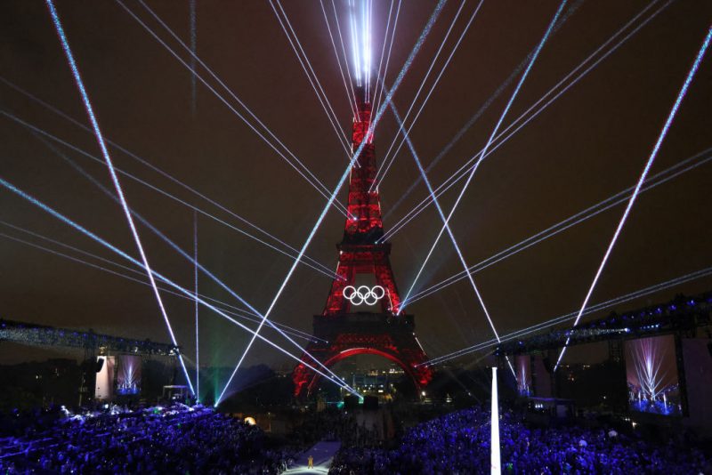 Lights illuminate the Eiffel Tower during the opening ceremony of the Paris 2024 Olympic Games in Paris on July 26, 2024. (Photo by Ludovic MARIN / POOL / AFP) (Photo by LUDOVIC MARIN/POOL/AFP via Getty Images)