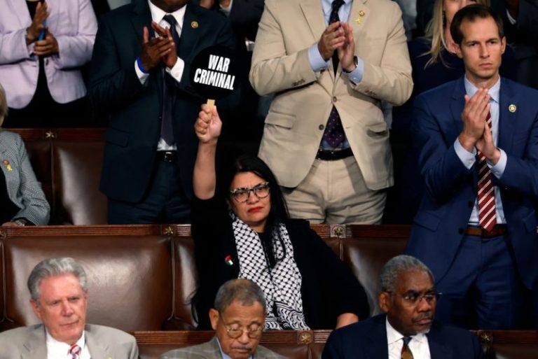 ‘Squad’ Member Tlaib Silently Protests Netanyahu Address With ‘War Criminal’ Sign