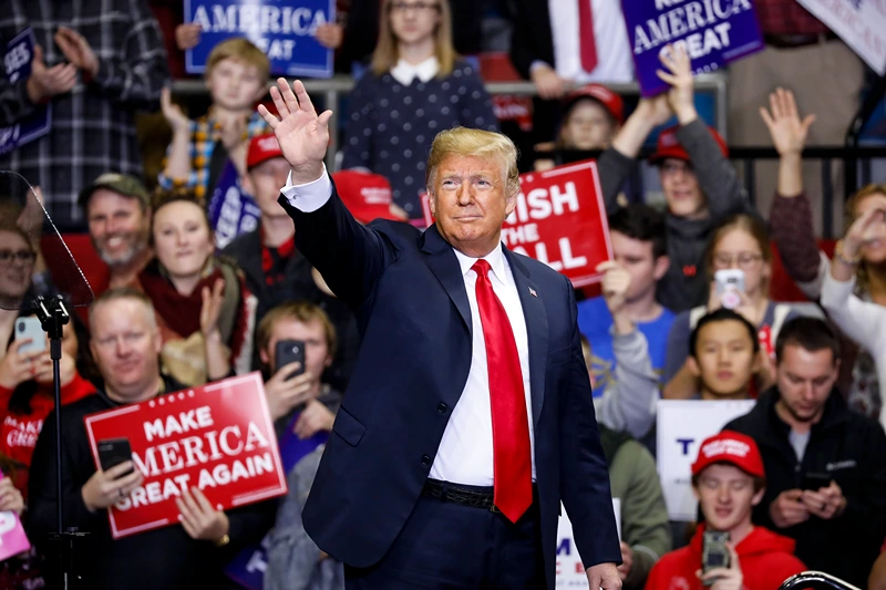 President Trump Holds Campaign Rally In Fort Wayne, Indiana
FORT WAYNE, IN - NOVEMBER 05: U.S. President Donald Trump arrives at a campaign rally for Republican Senate candidate Mike Braun at the County War Memorial Coliseum November 5, 2018 in Fort Wayne, Indiana. Braun is facing first-term Sen. Joe Donnelly (D-IN) in tomorrow's midterm election. Trump is campaigning nationwide in an effort to bolster GOP prospects. (Photo by Aaron P. Bernstein/Getty Images)