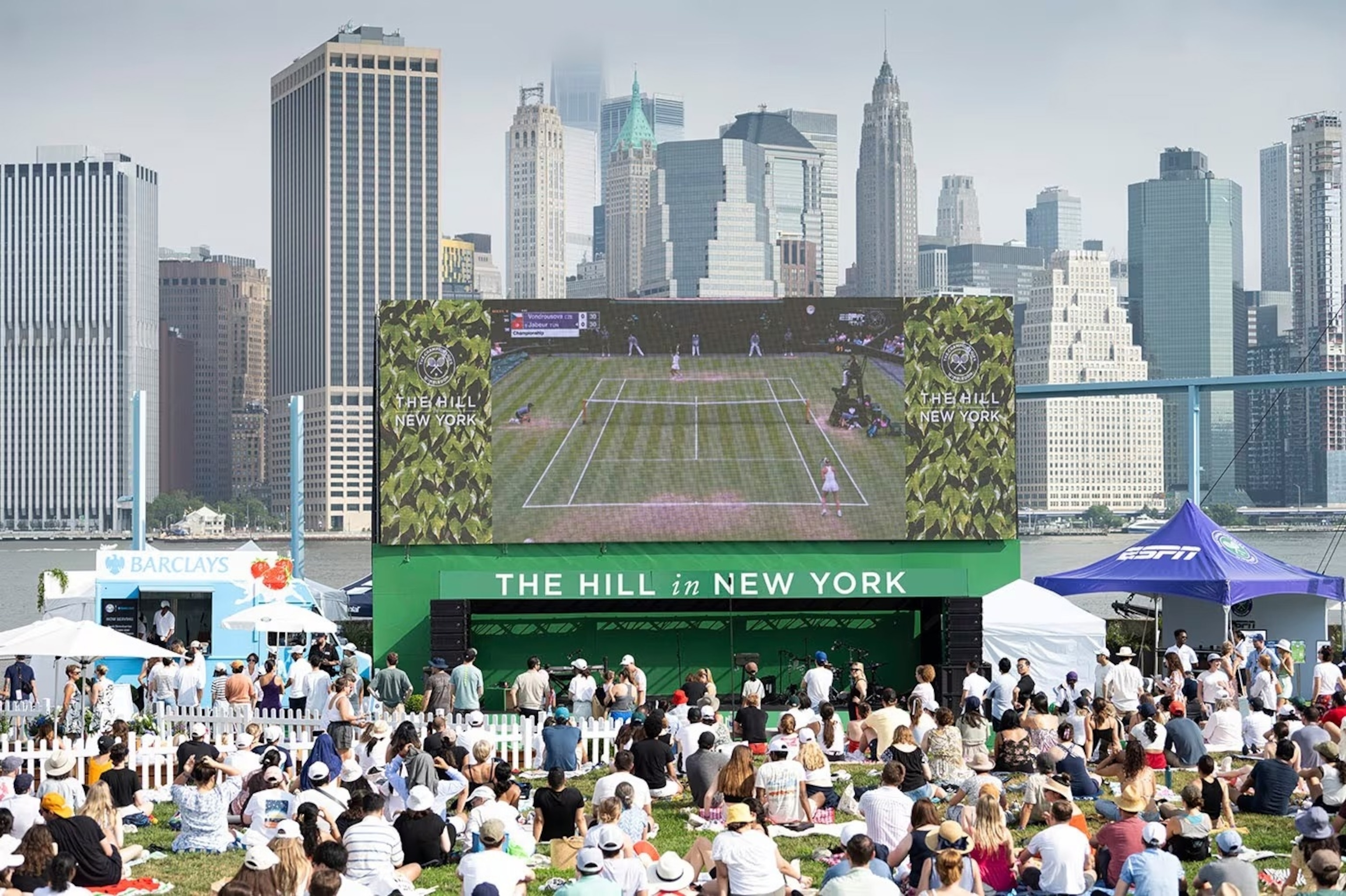 PHOTO: Fans gather across the pond in Brooklyn Bridge Park to experience a taste of Wimbledon at The Hill in New York.