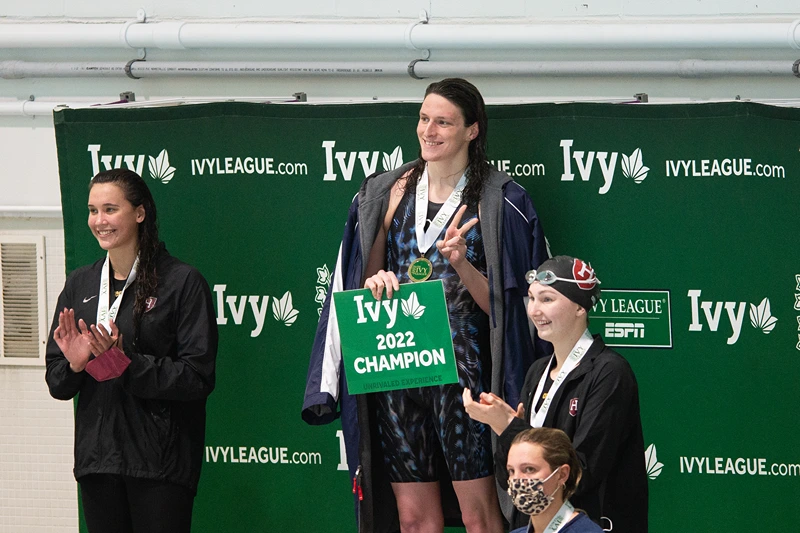 CAMBRIDGE, MA - FEBRUARY 18: University of Pennsylvania swimmer Lia Thomas smiles on the podium after winning the 200 yard freestyle during the 2022 Ivy League Women's Swimming and Diving Championships at Blodgett Pool on February 18, 2022 in Cambridge, Massachusetts. (Photo by Kathryn Riley/Getty Images)