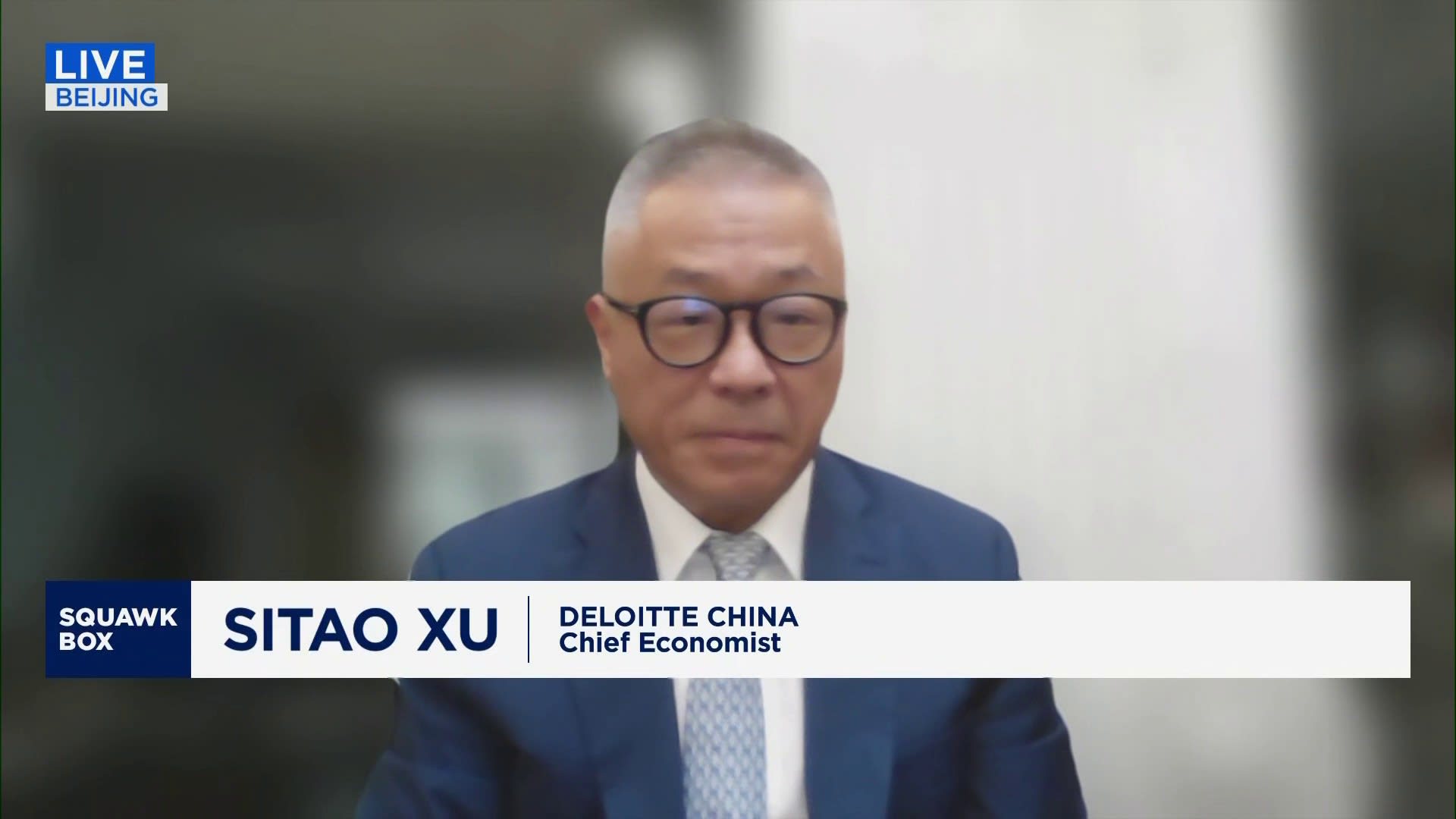 China needs 'more aggressive' monetary easing, says Deloitte China