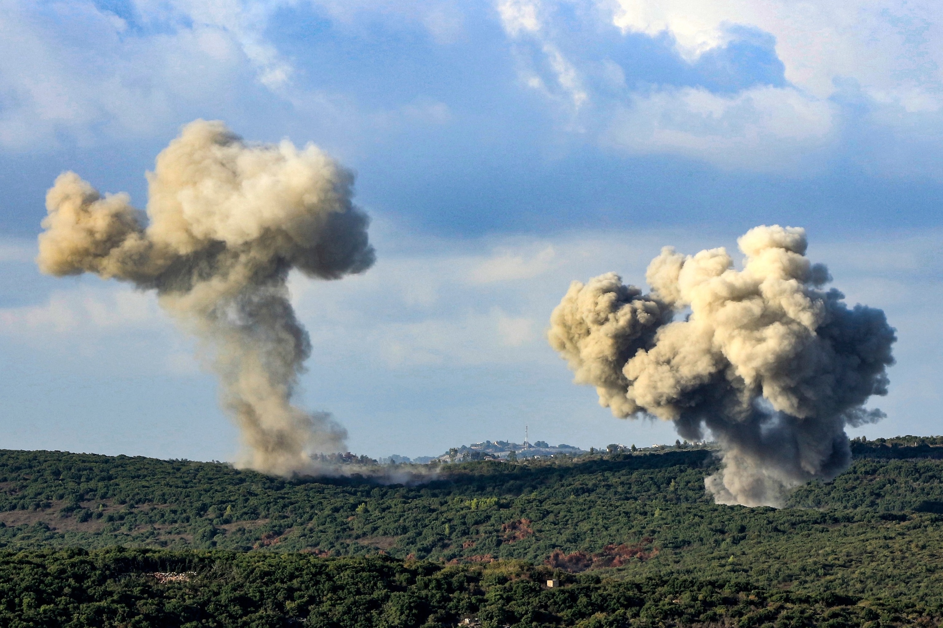 PHOTO: Smoke billows from the site of an Israeli strike that targeted the outskirts of the southern Lebanese village of Zibqin on September 22, 2024.