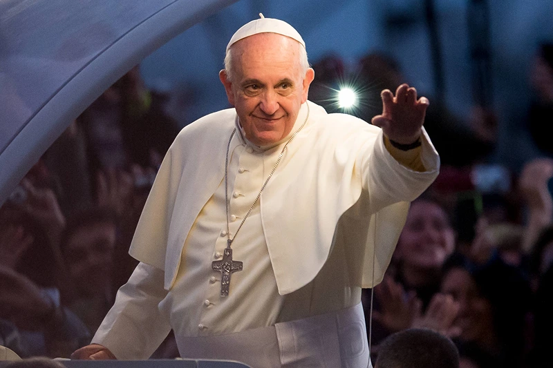 RIO DE JANEIRO, BRAZIL - JULY 26: Pope Francis waves from the Popemobile on his way to attend the Via Crucis on Copacabana Beach during World Youth Day celebrations on July 26, 2013 in Rio de Janeiro, Brazil. More than 1.5 million pilgrims are expected to join the pontiff for his visit to the Catholic Church's World Youth Day celebrations which is running July 23-28. (Photo by Buda Mendes/Getty Images