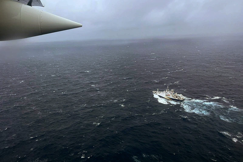 ATLANTIC OCEAN - JUNE 21: In this U.S. Coast Guard handout, a Coast Guard Air Station Elizabeth City, North Carolina HC-130 Hercules airplane flies over the French research vessel, L'Atalante approximately 900 miles East of Cape Cod during the search for the 21-foot submersible, Titan, June 21, 2023 over the Atlantic Ocean. The unified command is searching for five people after the Canadian research vessel Polar Prince lost contact with their submersible during a dive to the wreck of the Titanic on June 18, 2023. (Photo by U.S. Coast Guard via Getty Images)