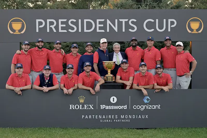 Team USA poses with PGA Tour commissioner Jay Monahan during the trophy ceremony of The Presidents Cup golf tournament. Mandatory Credit: Eric Bolte-Imagn Images