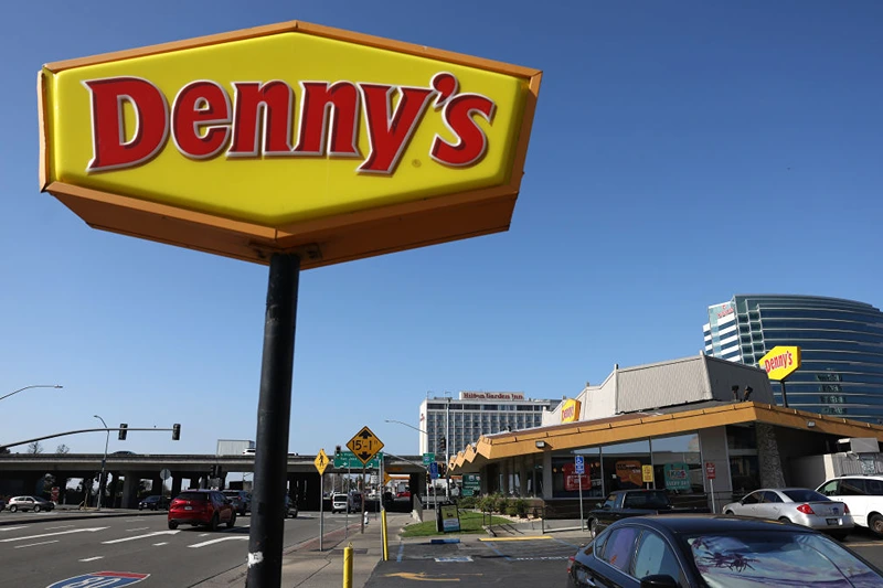 EMERYVILLE, CALIFORNIA - FEBRUARY 13: A sign is posted in front of a Denny's restaurant on February 13, 2023 in Emeryville, California. Denny's restaurant will report fourth quarter earnings today after the closing bell. (Photo by Justin Sullivan/Getty Images)