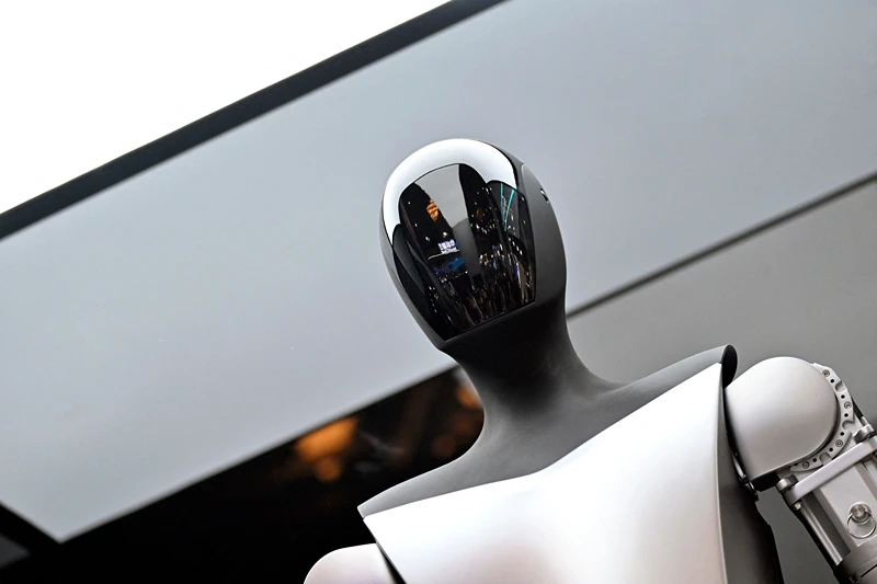 A Tesla robot is seen on display during the World Artificial Intelligence Conference (WAIC) in Shanghai on July 6, 2023. (Photo by WANG Zhao / AFP) (Photo by WANG ZHAO/AFP via Getty Images)