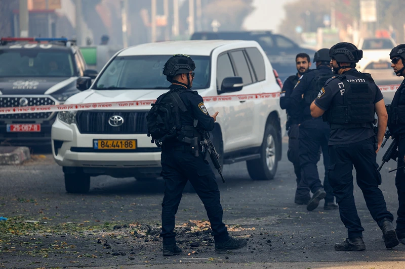 Israeli security forces and emergency personnel deploy at a site hit by rockets fired from Lebanon in the northern Israeli city of Kiryat Shmona near the Lebanese border on October 9, 2024, during the escalating war between Israel and Lebanon's mainly Hezbollah group amid the ongoing Gaza war. (Photo by Jalaa MAREY / AFP) (Photo by JALAA MAREY/AFP via Getty Images)