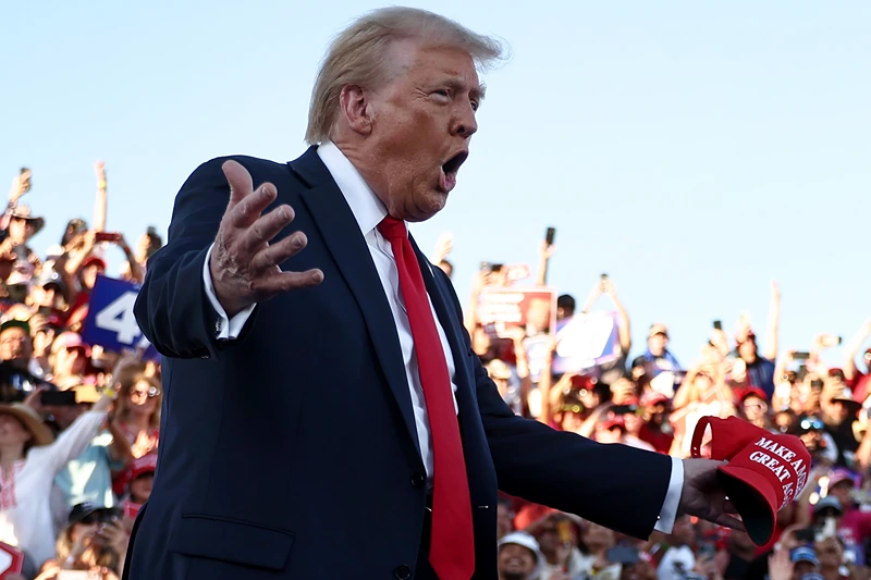 COACHELLA, CALIFORNIA - OCTOBER 12: Republican presidential nominee, former U.S. President Donald Trump gestures as he walks onstage for a campaign rally on October 12, 2024 in Coachella, California. With 24 days to go until election day, former President Donald Trump is detouring from swing states to hold the rally in Democratic presidential nominee, Vice President Kamala Harris' home state. (Photo by Mario Tama/Getty Images)