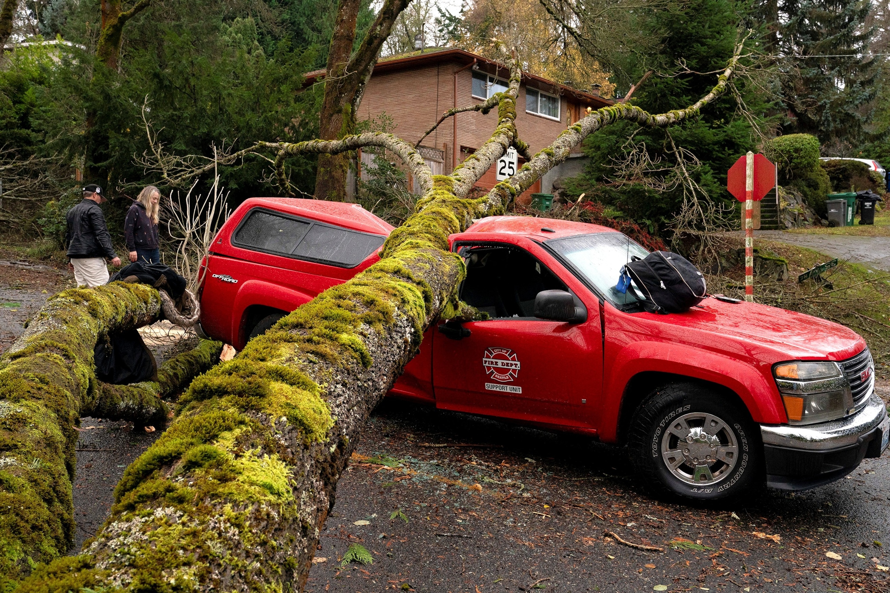 PHOTO: A fallen tree sits atop a fire department vehicle after a powerful storm hit the U.S. Pacific Northwest and western Canada, causing power outages while wreaking havoc on road travel, in Seattle, Washington, Nov. 20, 2024. 