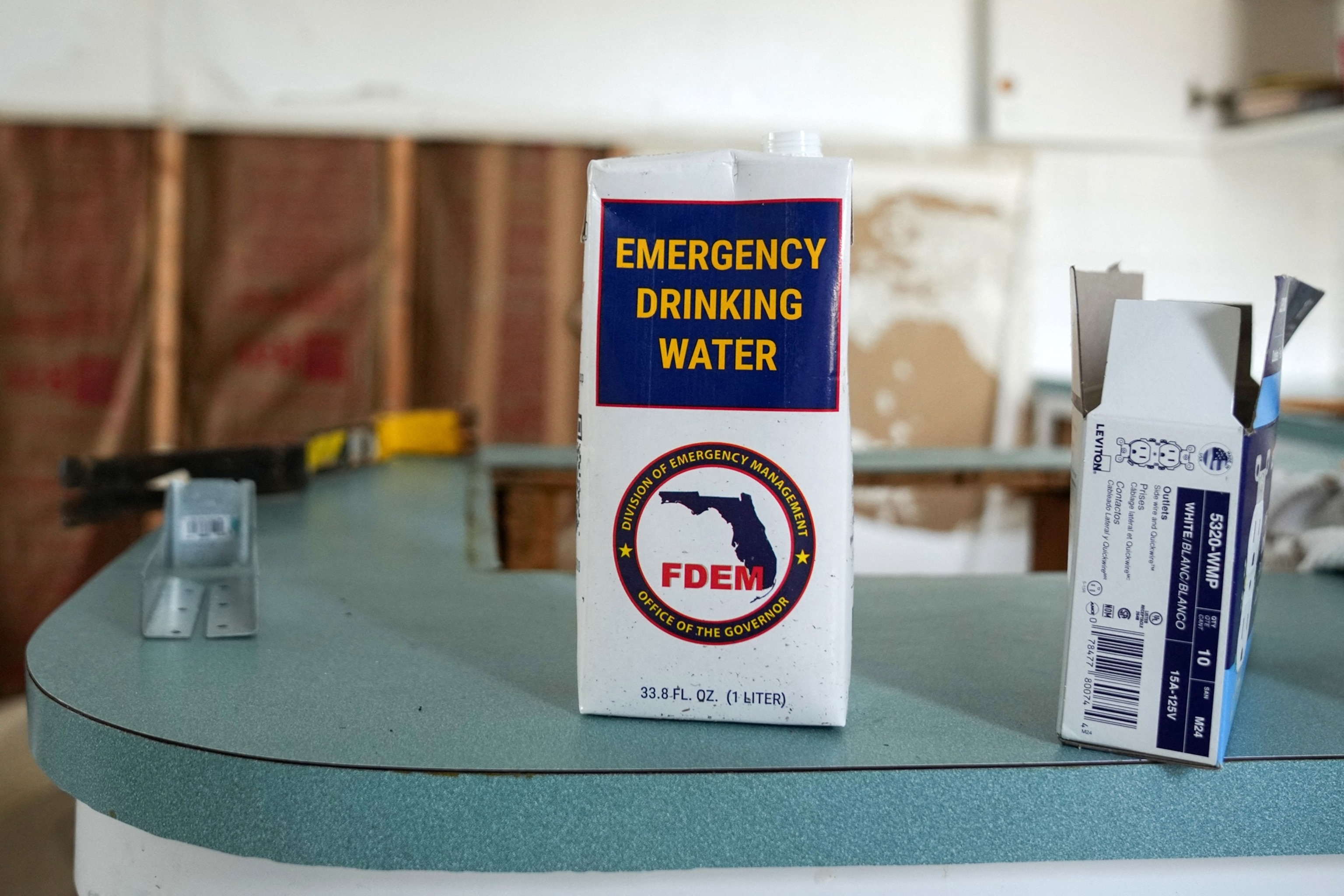 PHOTO: In this Oct. 7, 2024, file photo, a box of drinking water distributed by the Federal Emergency Management Agency (FEMA) sits on a counter in Treasure Island, Fla.