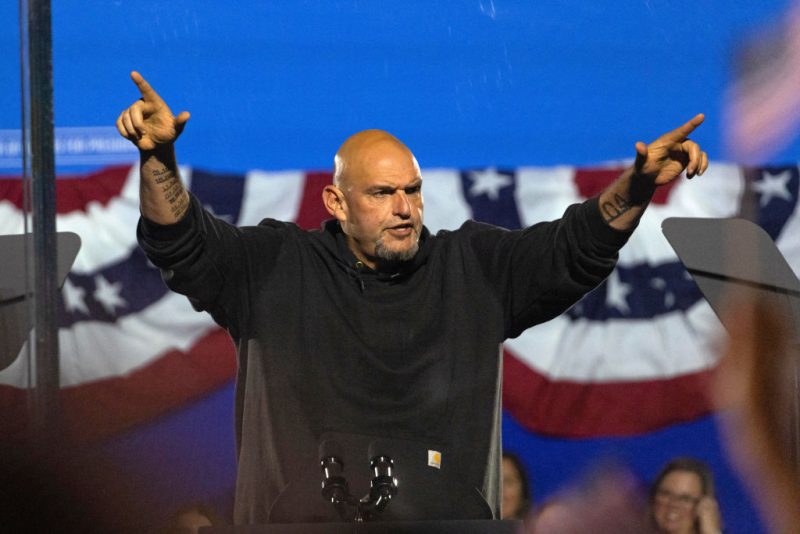 US Senator John Fetterman (D-PA) speaks ahead of US Vice President and Democratic presidential candidate Kamala Harris during a campaign rally at the Carrie Blast Furnaces National Historic Landmark outside Pittsburgh, in Rankin, Pennsylvania on November 4, 2024. (Photo by Rebecca DROKE / AFP) (Photo by REBECCA DROKE/AFP via Getty Images)