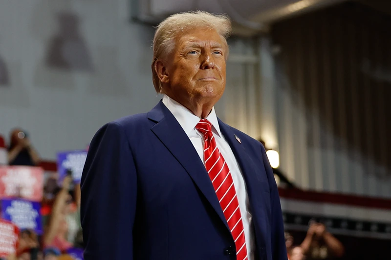 ROCKY MOUNT, NORTH CAROLINA - OCTOBER 30: Republican presidential nominee, former U.S. President Donald Trump greets supporters during a campaign event at the Rocky Mount Event Center on October 30, 2024 in Rocky Mount, North Carolina. With less than a week until Election Day, Trump is campaigning for re-election in the battleground states of North Carolina and Wisconsin. (Photo by Chip Somodevilla/Getty Images)