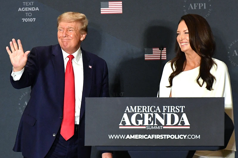 Brooke Rollins, AFPI President & CEO, watches as former US President Donald Trump makes his way off stage after speaking at the America First Policy Institute Agenda Summit in Washington, DC, on July 26, 2022. (Photo by MANDEL NGAN / AFP) (Photo by MANDEL NGAN/AFP via Getty Images)