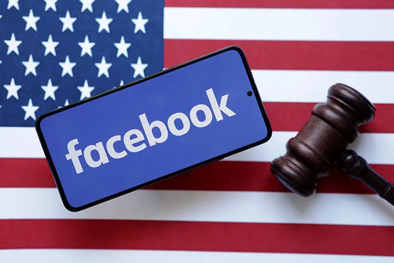 Facebook, U.S. flag and Judge gavel are seen in this illustration taken, August 6, 2024. REUTERS/Dado Ruvic/Illustration/File Photo