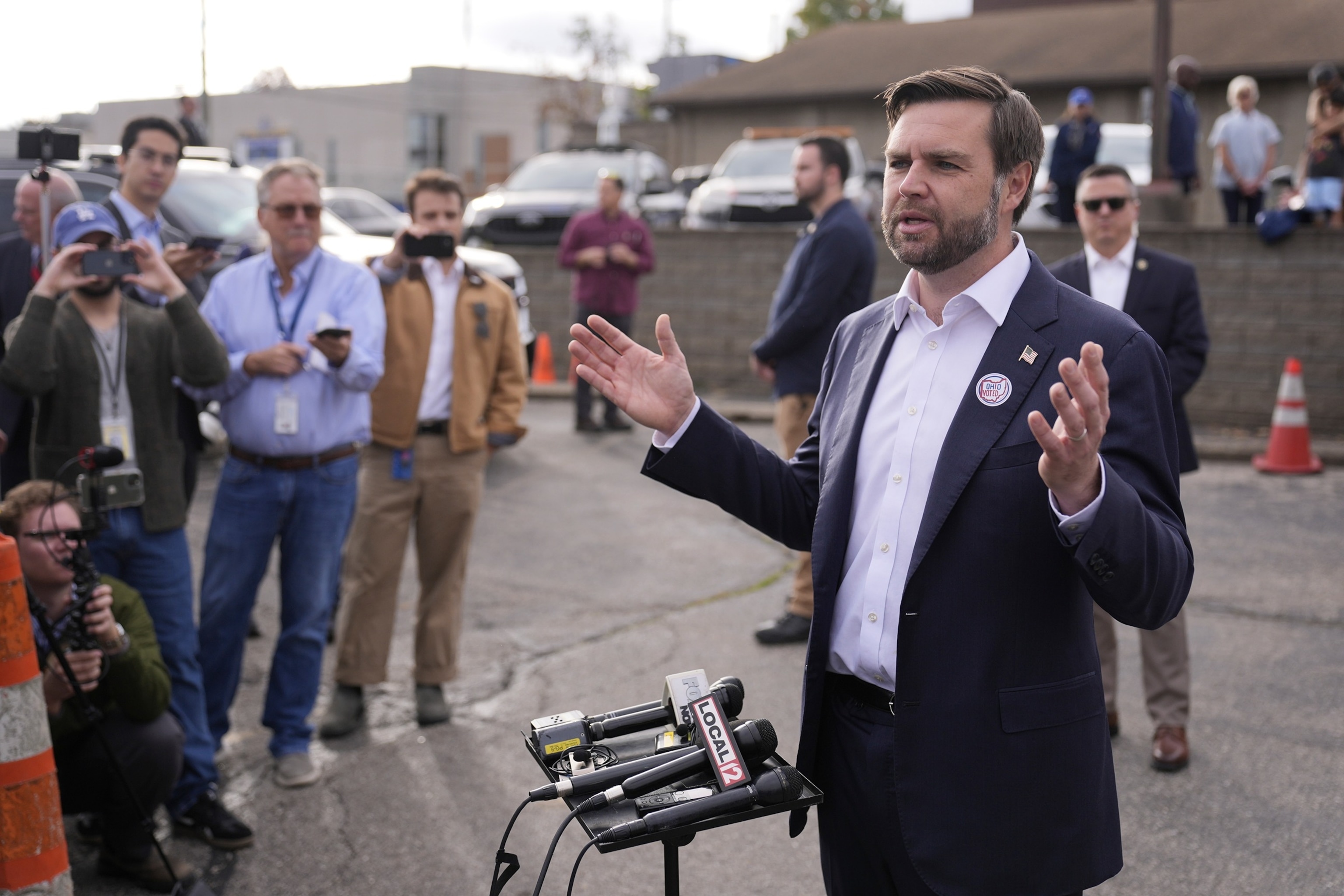 PHOTO: Republican vice presidential nominee Sen. JD Vance, R-Ohio, speaks outside after voting at the St Anthony of Padua Maronite Catholic Church on election day, Nov. 5, 2024, in Cincinnati. 