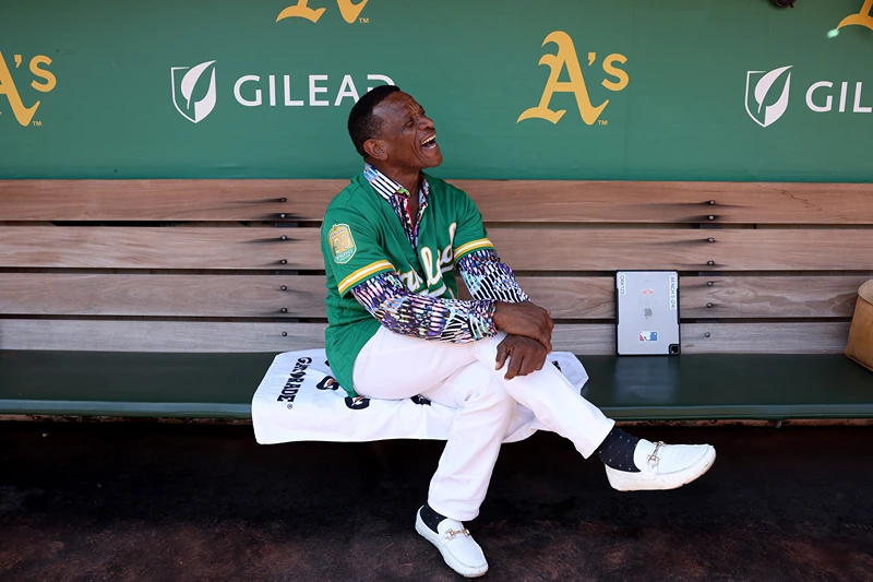 Former Oakland Athletics player Rickey Henderson sits in the dugout before the Oakland Athletics game against the Texas Rangers at the Oakland Coliseum on September 26, 2024 in Oakland, California. Today will be the final Athletics game played at the Coliseum. (Photo by Ezra Shaw/Getty Images)