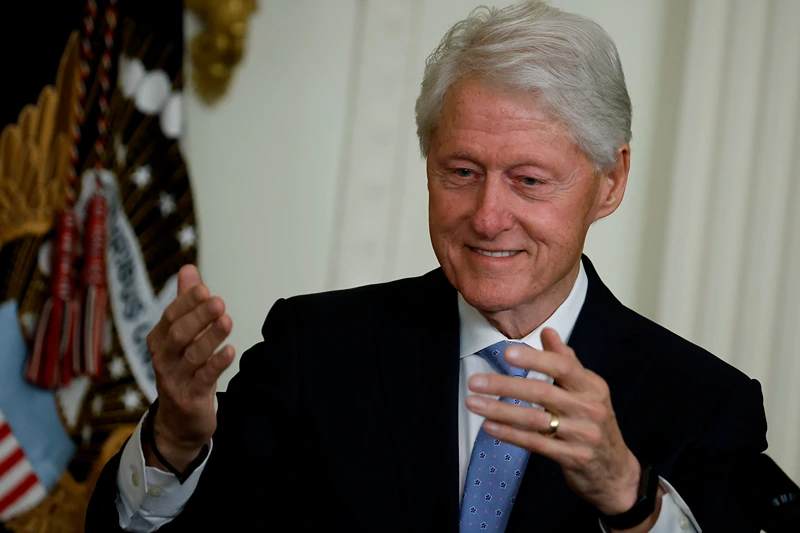 Former U.S. President Bill Clinton delivers remarks during an event marking the 30th anniversary of the Family and Medical Leave Act in the East Room of the White House on February 02, 2023 in Washington, DC. Some Democrats in Congress are calling on Biden to expand access to the FMLA by, in part, including a national 12-week paid family leave system as part of his proposed federal budget. (Photo by Chip Somodevilla/Getty Images)