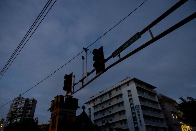 An intersection without stop lights is seen in the dark in San Juan, Puerto Rico after a major power outage hit the island on December 31, 2024. A major power outage plunged much of Puerto Rico into darkness Tuesday, with the US island territory's electric utility saying restoration could take up to two days. The "island-wide blackout" began at 5:30 am (0930 GMT), Luma Energy said in a social media statement. (Photo by Ricardo ARDUENGO / AFP) (Photo by RICARDO ARDUENGO/AFP via Getty Images)