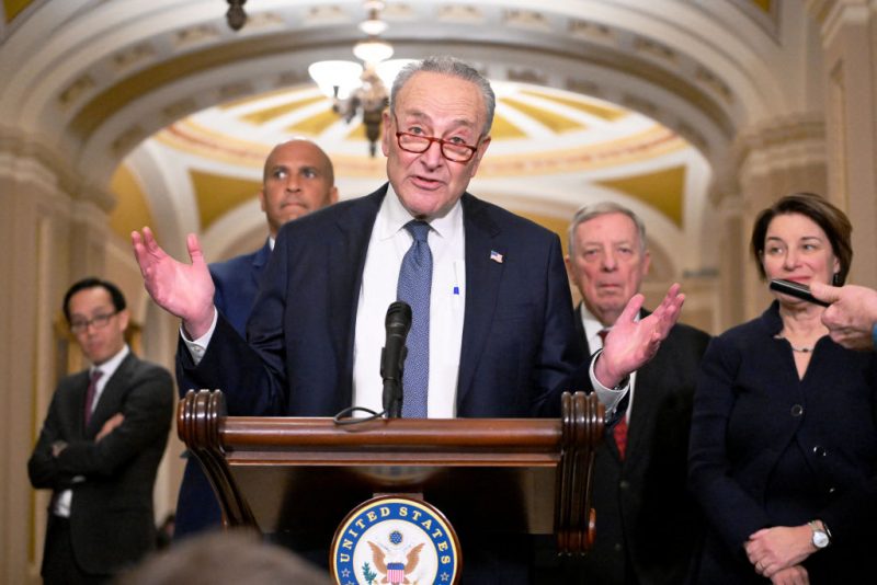 US Senate Majority Leader Chuck Schumer, with Democratic majority whip Dick Durbin (2nd R, Senator Amy Klobuchar (R) and Senator Cory Booker (2nd L), speaks with reporters at the US Capitol on December 3, 2024. Senate Democrats held a closed-door election December 3 to name their leadership posts for the next two years. Schumer was re-elected to lead Democratic Senators as Minority Leader in the 119th Congress. (Photo by ROBERTO SCHMIDT / AFP) (Photo by ROBERTO SCHMIDT/AFP via Getty Images)