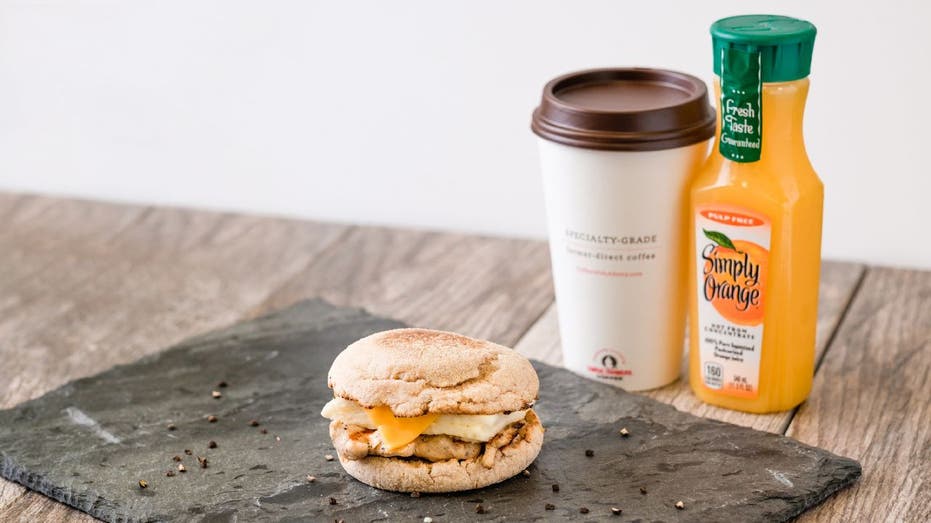 Chick-fil-A Egg White Grill sandwich with coffee and juice