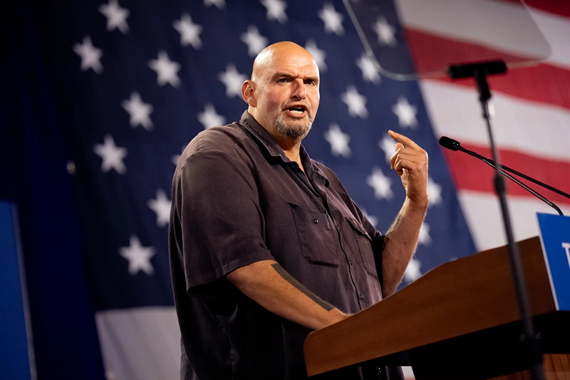 YORK, PENNSYLVANIA - OCTOBER 2: Sen. John Fetterman (D-PA) speaks at a rally for Democratic vice presidential nominee Minnesota Gov. Tim Walz at York Exposition Center UPMC Arena on October 2, 2024 in York, Pennsylvania. Walz is holding a rally a day after debating Republican vice presidential Nominee Sen. JD Vance (R-OH) at the CBS Broadcast Center in New York City. (Photo by Andrew Harnik/Getty Images)