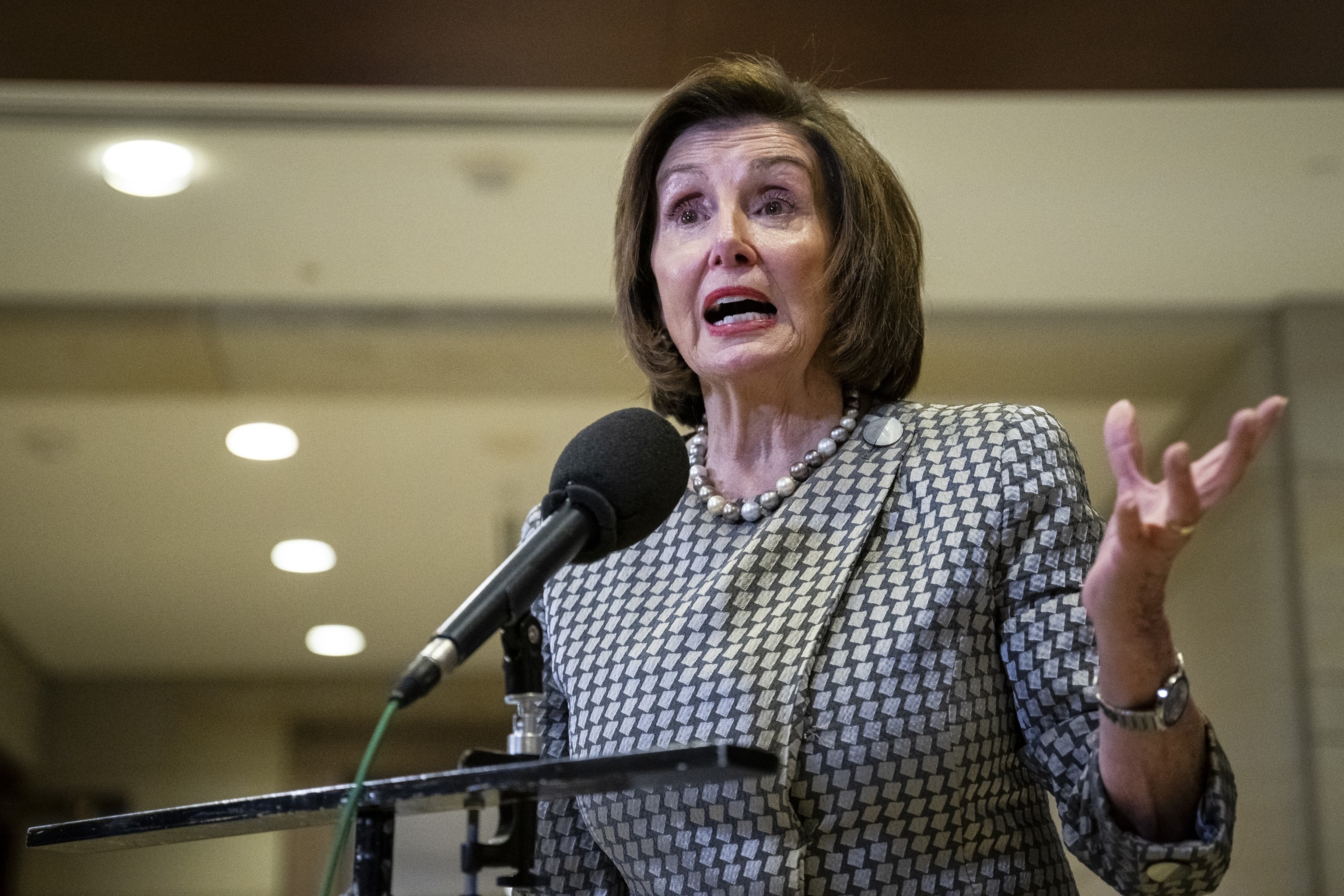 PHOTO: Representative Nancy Pelosi speaks to members of the media after a classified briefing on TikTok at the US Capitol in Washington, DC, March 12, 2024.