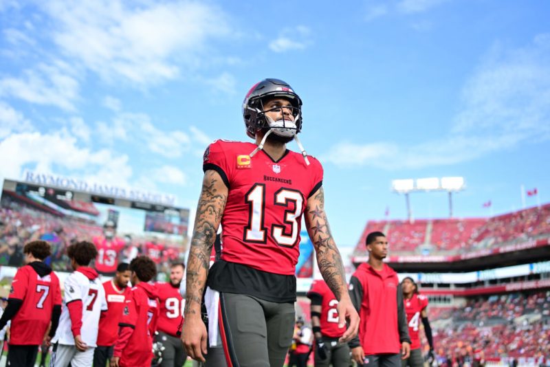 TAMPA, FLORIDA - DECEMBER 29: Mike Evans #13 of the Tampa Bay Buccaneers looks on before the game against the Carolina Panthers at Raymond James Stadium on December 29, 2024 in Tampa, Florida. (Photo by Julio Aguilar/Getty Images)