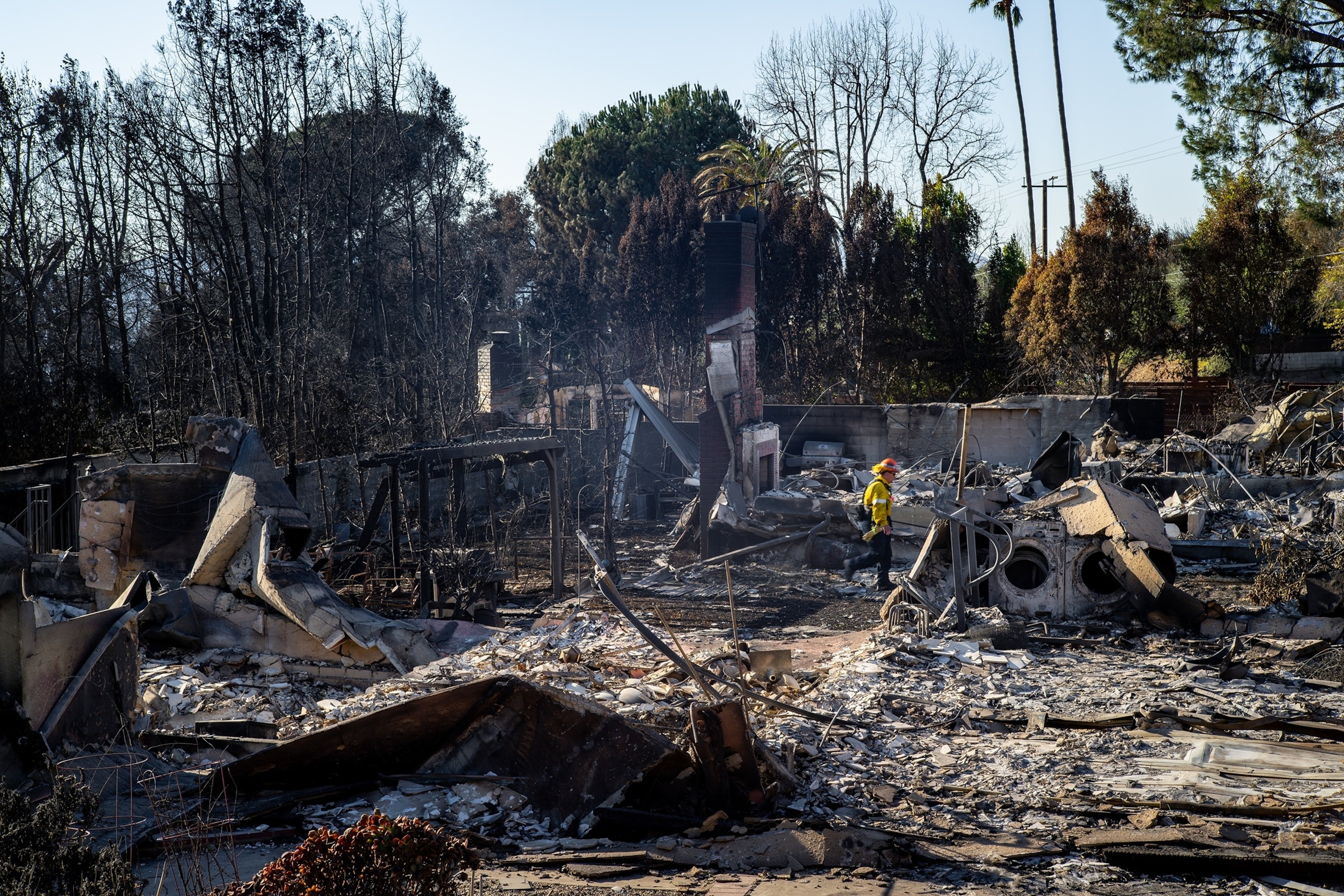 PHOTO: A First Responder assess a destroyed residence in Altadena, Calif., Jan. 16, 2025.