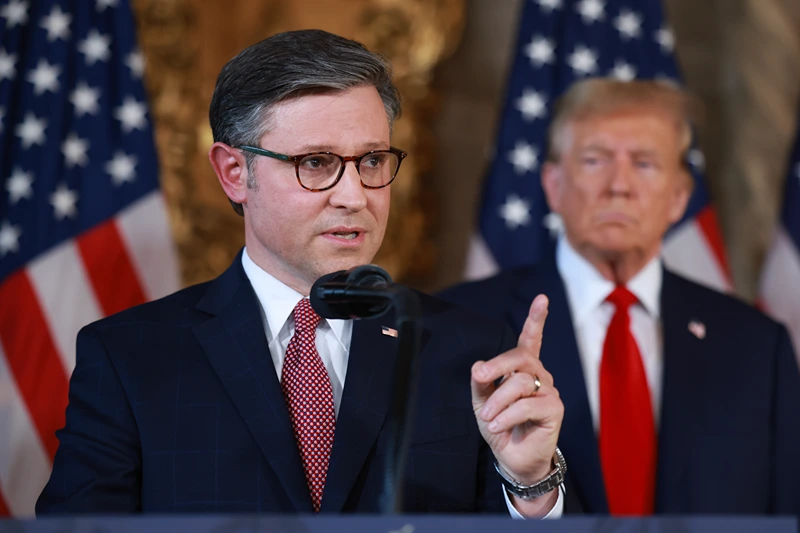 PALM BEACH, FLORIDA - APRIL 12: Republican presidential candidate former President Donald Trump listens as Speaker of the House Mike Johnson (R-LA) speaks during a press conference at Mr. Trump's Mar-a-Lago estate on April 12, 2024, in Palm Beach, Florida. They spoke about "election integrity," which has been one of the former president's top issues. (Photo by Joe Raedle/Getty Images)