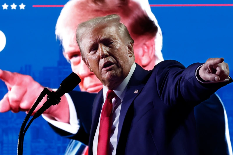 GRAND RAPIDS, MICHIGAN - NOVEMBER 05: Republican presidential nominee, former President Donald Trump speaks during a campaign rally at Van Andel Arena on November 05, 2024 in Grand Rapids, Michigan. Trump campaigned for re-election in the battleground states of North Carolina and Pennsylvania before arriving for his last rally minutes after midnight in Michigan. (Photo by Chip Somodevilla/Getty Images)