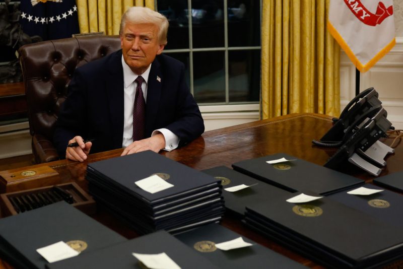 WASHINGTON, DC - JANUARY 20: President Donald Trump signs executive orders in the Oval Office on January 20, 2025 in Washington, DC. Trump takes office for his second term as the 47th president of the United States. (Photo by Anna Moneymaker/Getty Images)