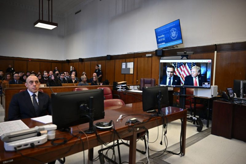 US President-elect Donald Trump appears remotely for a sentencing hearing in front of New York State Judge Juan Merchan in the criminal case in which he was convicted in 2024 on charges involving hush money paid to a porn star, at New York Criminal Court in Manhattan in New York City, on January 10, 2025. (Photo by ANGELA WEISS / POOL / AFP) (Photo by ANGELA WEISS/POOL/AFP via Getty Images)