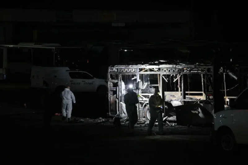 Security forces and bomb disposal units are deployed to the scene of a bus explosion in Bat Yam on February 20, 2025. Israeli police said that bombs on three buses exploded in the central city of Bat Yam on February 20, 2025 evening, with a local official saying there were no injuries. Defence Minister Israel Katz accused "Palestinian terrorist organisations" of carrying out the blasts, while Prime Minister Benjamin Netanyahu was set to hold a security meeting. (Photo by OREN ZIV / AFP) (Photo by OREN ZIV/AFP via Getty Images)