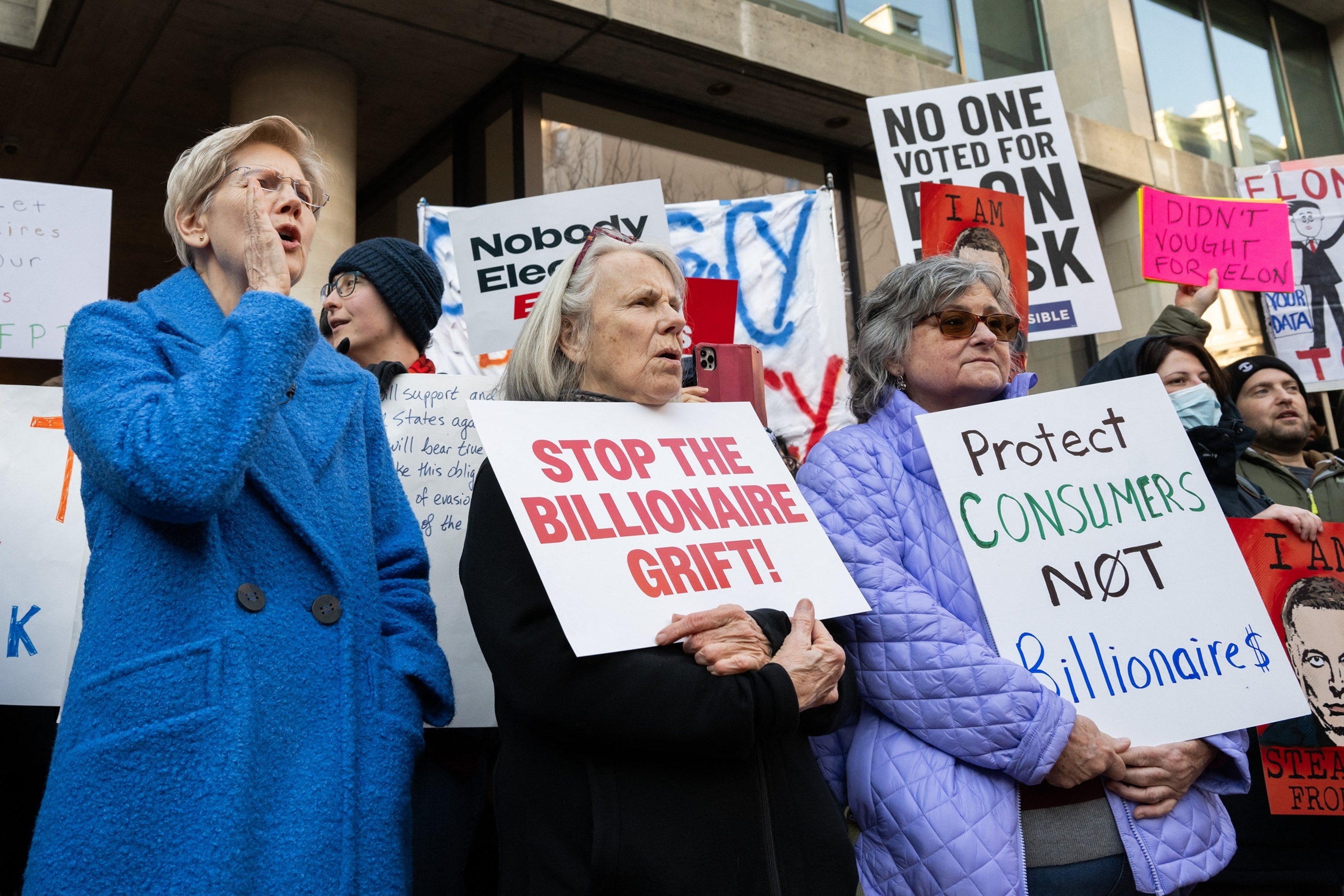 PHOTO: Senator Elizabeth Warren, D-Mass., speaks during a protest against President Donald Trump and DOGE Elon Musk's anticipated plan to close the Consumer Financial Protection Bureau in front of the CFPB headquarters in Washington, D.C., Feb. 10, 2025. 