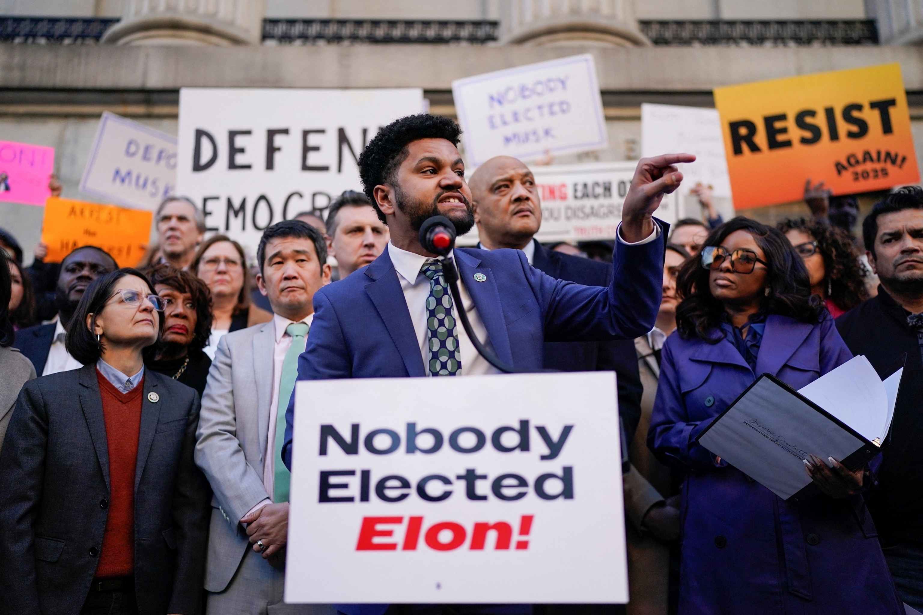 PHOTO: Rep. Maxwell Frost (D-FL) gestures as demonstrators rally outside the U.S. Treasury Department, in Washington, Feb. 4, 2025.