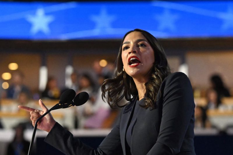 US Representative Alexandria Ocasio-Cortez (D-NY) speaks on the first day of the Democratic National Convention (DNC) at the United Center in Chicago, Illinois, on August 19, 2024. Vice President Kamala Harris will formally accept the party's nomination for president at the DNC which runs from August 19-22 in Chicago. (Photo by ANDREW CABALLERO-REYNOLDS / AFP) (Photo by ANDREW CABALLERO-REYNOLDS/AFP via Getty Images)