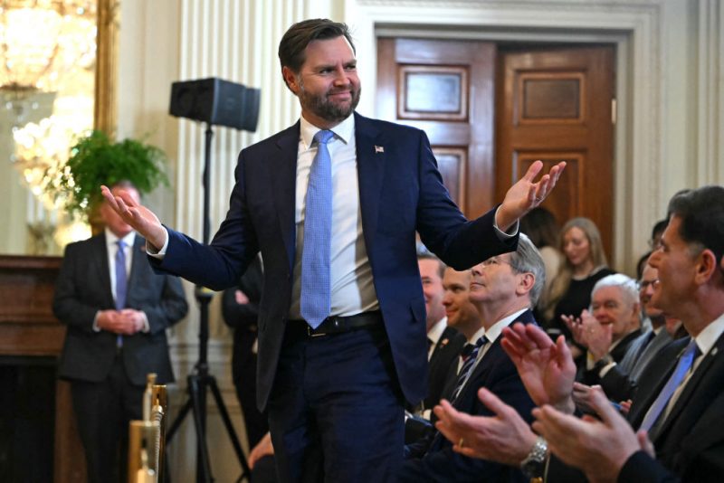 US Vice President JD Vance gestures after unseen US President Donald Trump asked him to stand up during a press conference with unseen Israel's Prime Minister Benjamin Netanyahu in the East Room of the White House in Washington, DC, on February 4, 2025. (Photo by ANDREW CABALLERO-REYNOLDS / AFP) (Photo by ANDREW CABALLERO-REYNOLDS/AFP via Getty Images)