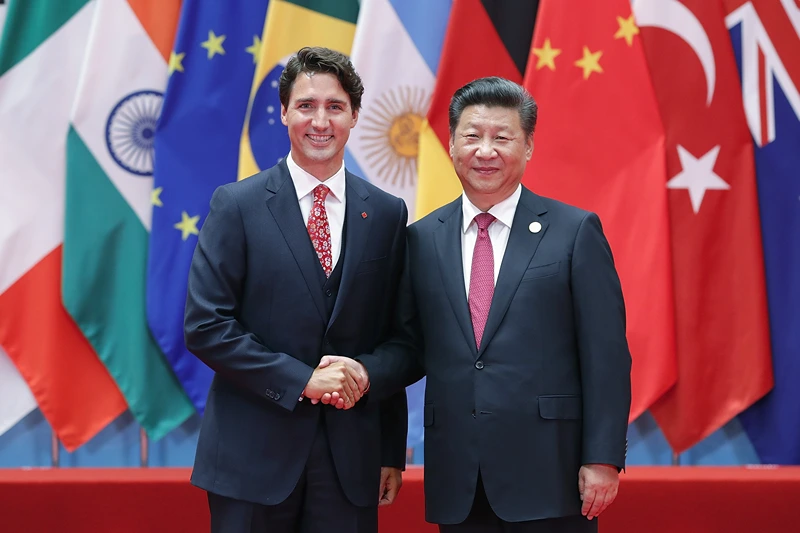 HANGZHOU, CHINA - SEPTEMBER 04: Chinese President Xi Jinping (right) shakes hands with Canadian Prime Minister Justin Trudeau to the G20 Summit on September 4, 2016 in Hangzhou, China. World leaders are gathering in Hangzhou for the 11th G20 Leaders Summit from September 4 to 5. (Photo by Lintao Zhang/Getty Images)